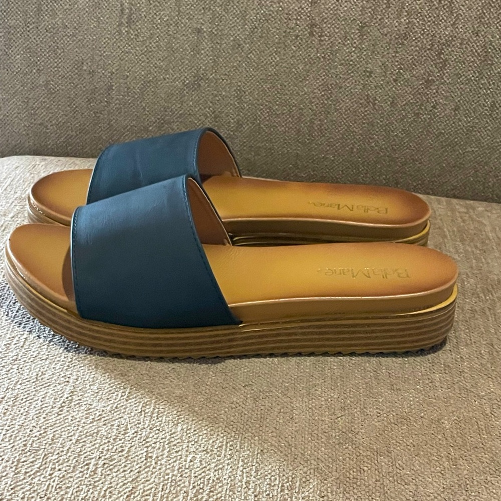 Brand new! Size 7.5 Bella Marie sandals.